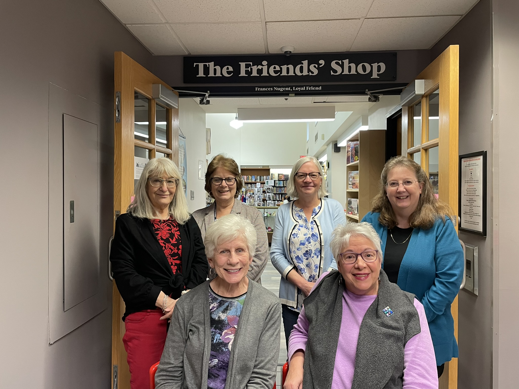 Friends Board members in front of The Friends' Shop